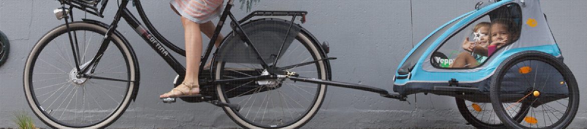 Fietsstoeltje voor of achter: wat kies je?